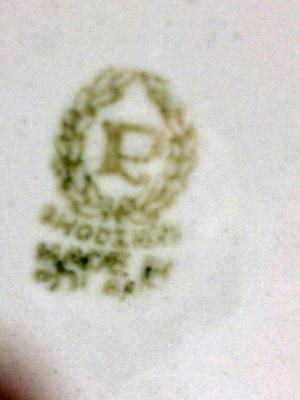 small I know P OR R in a Wreath Marking on a red vase with white flowers small I know P OR R in a Wreath Marking on a red vase with white flowers