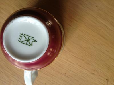 2 items - A Vienna Style Plate with black & gold pottery mark, and cup with an H and duck OR chicken backstamp