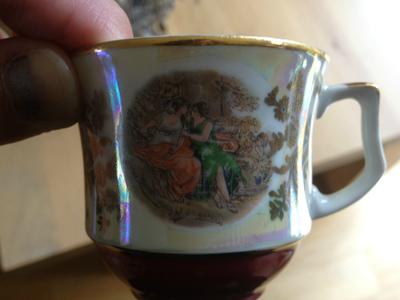 2 items - A Vienna Style Plate with black & gold pottery mark, and cup with an H and duck OR chicken backstamp