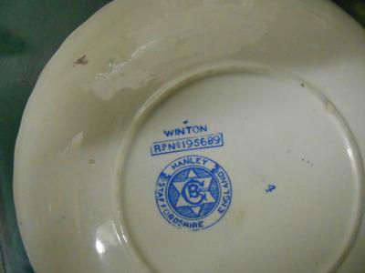 6 pointed star mark with a G