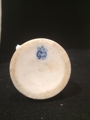 A Pair of Boy Girl Figurines with a 3 loops crown mark with a cross on top and two Gs one a backtofront mirror G