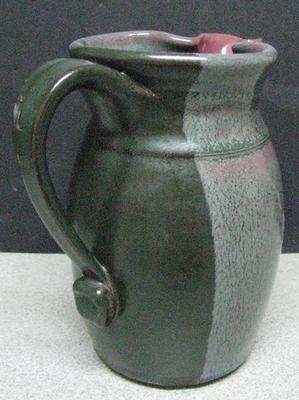 Art Pottery Studio pitcher with impressed whale or fish mark or 'P'