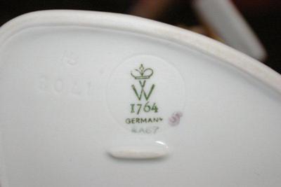 Crown above V above W Germany on cute lady in shorts figurine