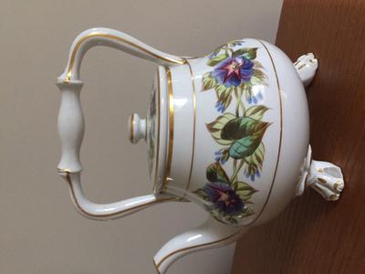 family heirloom unmarked teapot with ceramic handle