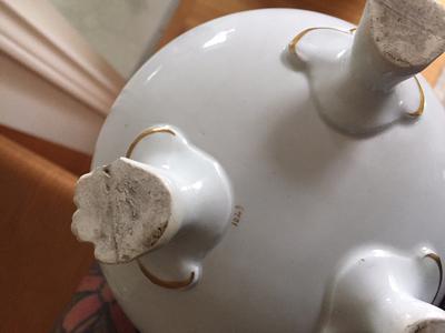 family heirloom teapot with 3 feet base photo