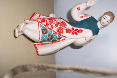 sewing woman figurine