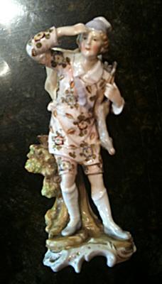 Figurine query - Pottery mark looks like pound sign