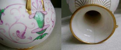 ewer x mark with two dots