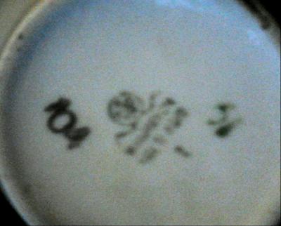 Close up of mark - Pottery Mark - crest within a circle, two wavy lines, W A L? 