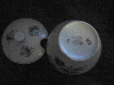 Pottery Mark - crest within a circle, two wavy lines, W A L? 