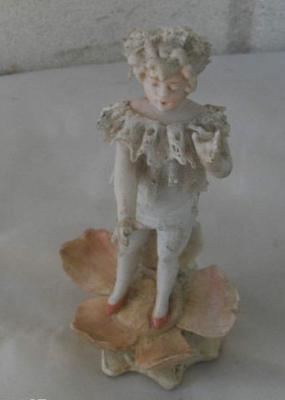 girl child figurine with unusual stick figure impressed mark