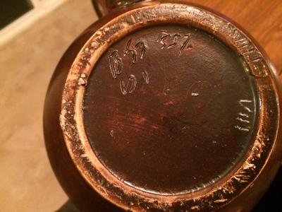 Old Round Brown pottery bowl with B57 mark on base 