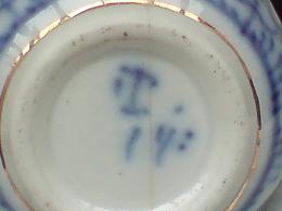 Porcelain Mark Query - What looks like a 'T' on Indian Asian(?) handwritten marking