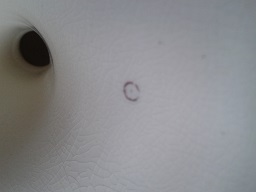 Pottery Cake Stand with Girl & Dog image Marked with small blue circle stamps and what looks like a C, a K or a D followed by a space then an E