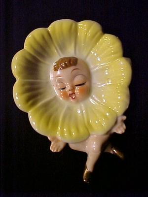 Pottery mark on cute vintage flower ceramic - backstamp is flower or a clover, with 2 squares around it (looks a bit like a picture frame) and the word “Japan” under