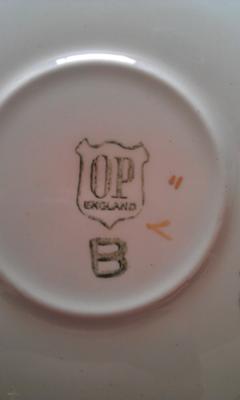 Pottery Mark query - Initals 'OP ENGLAND' within a shield and the Inital 'B'underneath