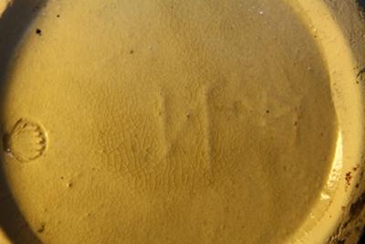 Pottery Mark Query - Looks like reverse N letter beneath glazing/pottery Jar