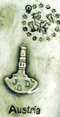 Julius Dressler Mark Close Up (looks like a tower or lighthouse)