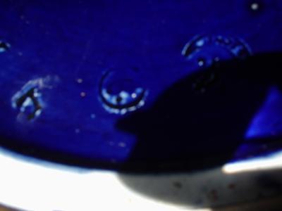 Pottery Mark with 2 Crescent shapes  a 5 or an S, a 7 or an axe, 4 in total under glaze