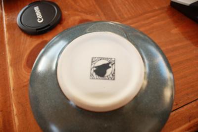 Pottery Mark with a Circle Inside a Square with a Howling Wolf