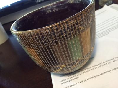 Signed by an alien? Illegible little old luster pot