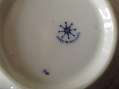 Star shape mark with letter S Made in England