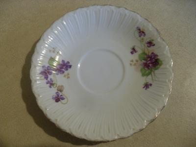 A saucer showing the violets pattern