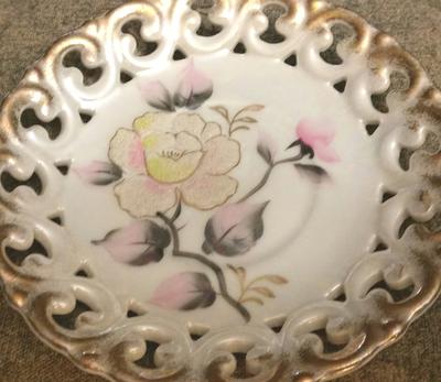 horses head pottery mark on floral pattern reticulated dish