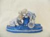 Anchor Mark Query - Boys Playing Marbles Figurine