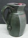 Art Pottery Studio pitcher with impressed whale or fish mark or 'P'