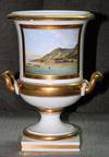 White and gold urn