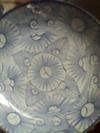 Hand painted geometric blue and white floral pattern on a bowl/plate