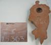 Terracotta Caribbean lady face wall plaque with pottery mark saying 'something... PORT'