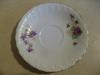 A saucer showing the violets pattern