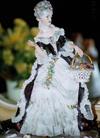 Two exquisite porcelain lace sisters with an 