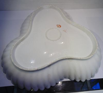 The mystery mark smile and face or moon and 3 stars