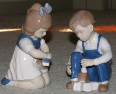 unidentified figurine pottery mark - crossed swords with oval hilts 'hand painted' and 1859