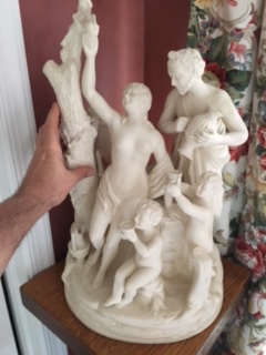 white figural group Two Cs intertwined, one reversed below 4 pronged crown