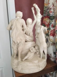 white figural group Two Cs intertwined, one reversed below 4 pronged crown